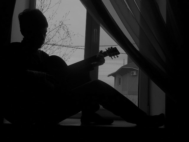 Anatolii Ovcharuk with guitar.